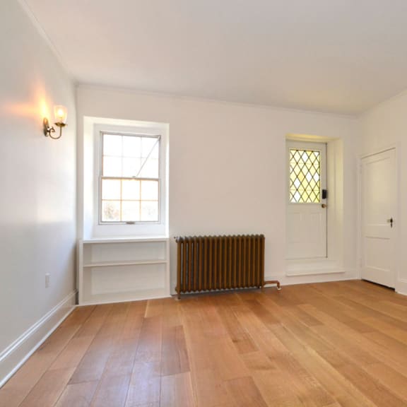 a room with a window and a door.