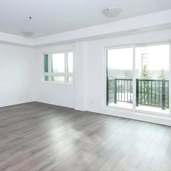 a room with a window and a balcony.