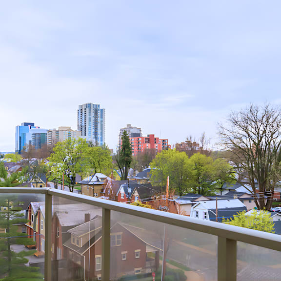 a view of a residential area with houses and trees.