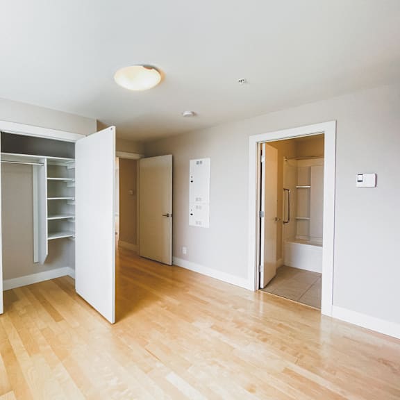 a room with a white door and a white wall.