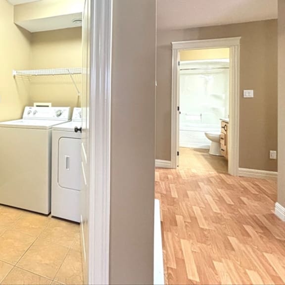 a laundry room with a washer and dryer.