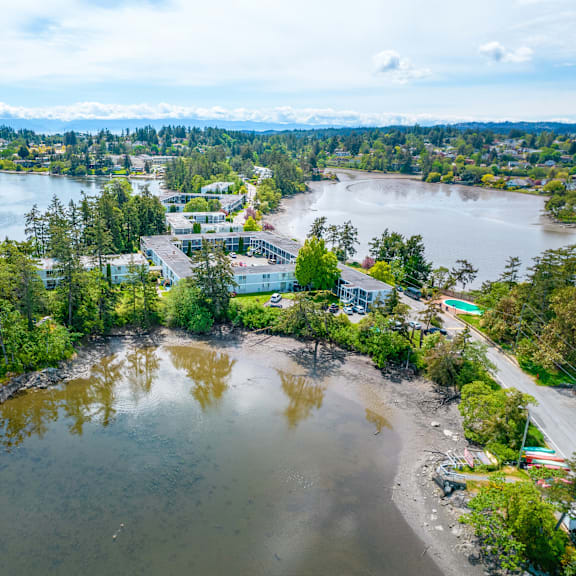 a small island with a building on it surrounded by water.