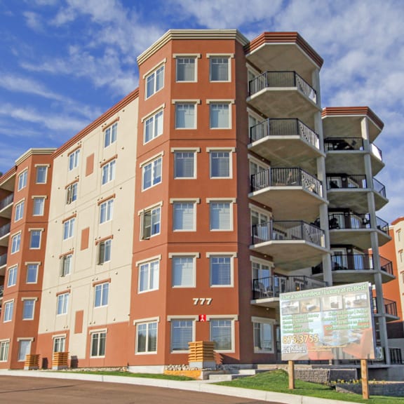 a large apartment building with the number 777 on the front.