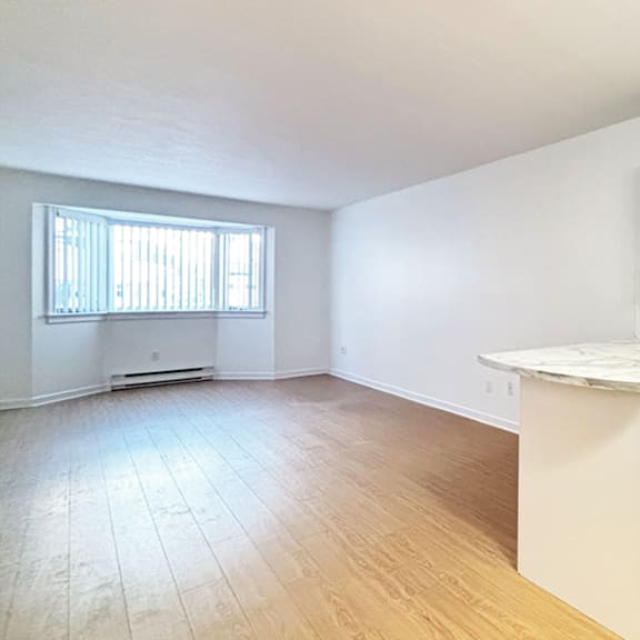 a room with a window and a counter.