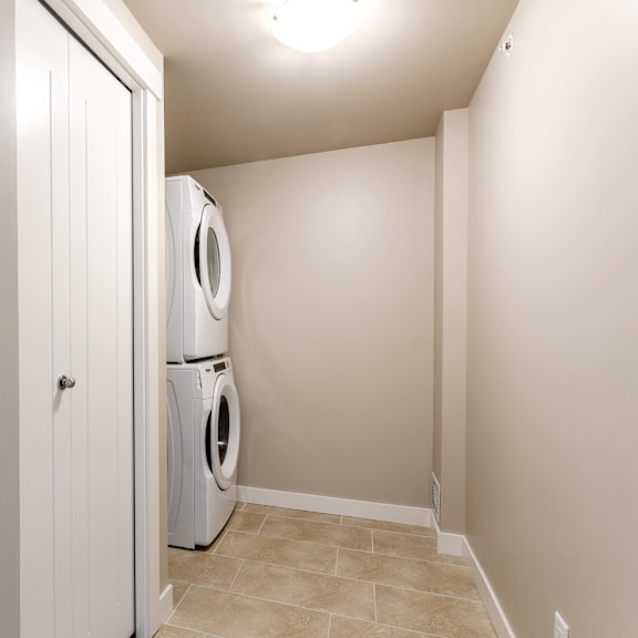 a laundry room with a washer and dryer in it.