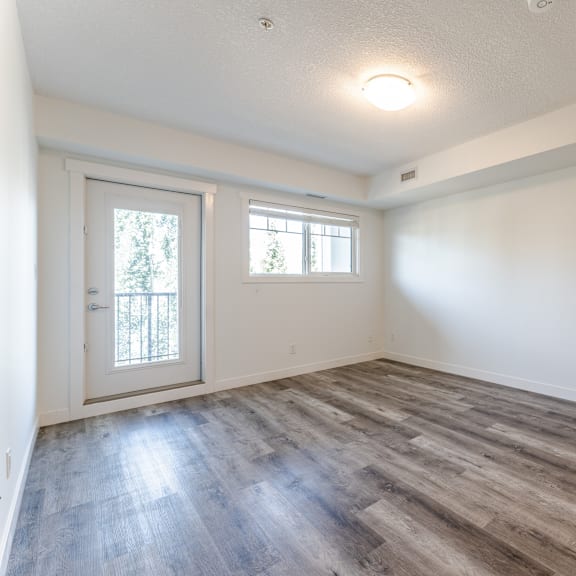 a room with a door and a window.