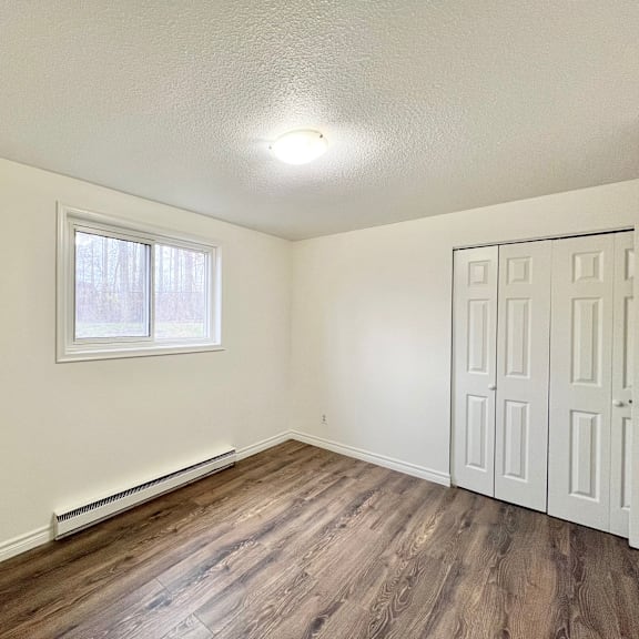 a room with a window and a door.