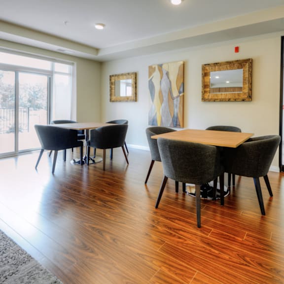 a conference room with a long table and chairs.