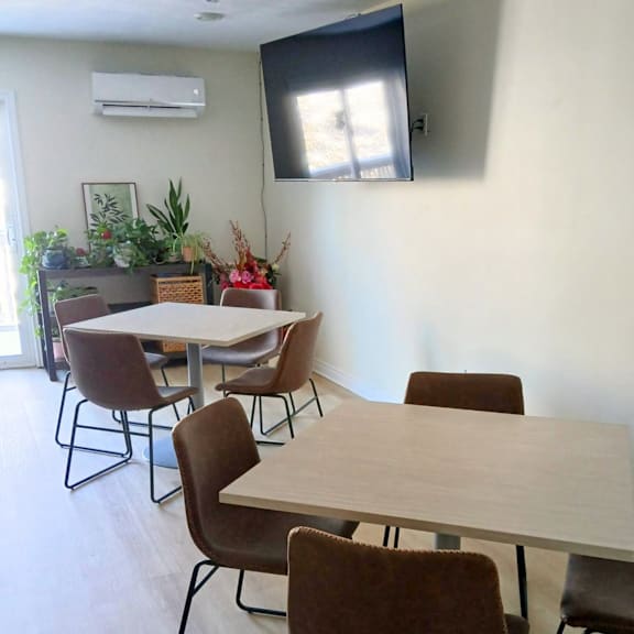 a conference room with a long table and chairs.