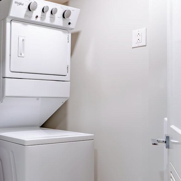 a white oven and dishwasher in a kitchen.
