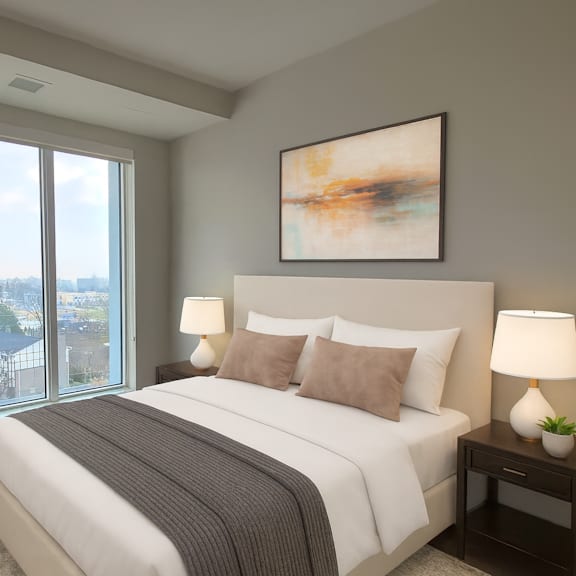 a bedroom with a large bed and a painting on the wall.