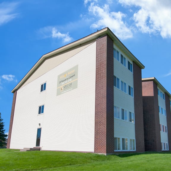 a white and red building with a sign that says "k-12 school".