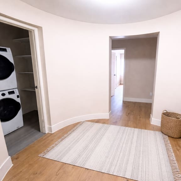 a laundry room with a washer and dryer in it.