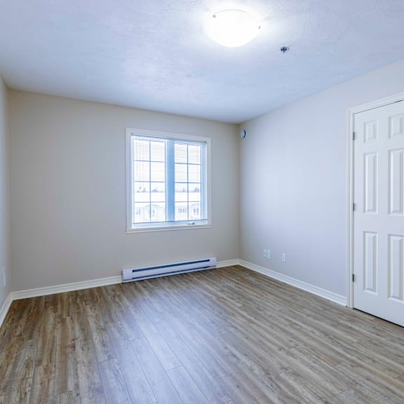 a room with a window and a door.