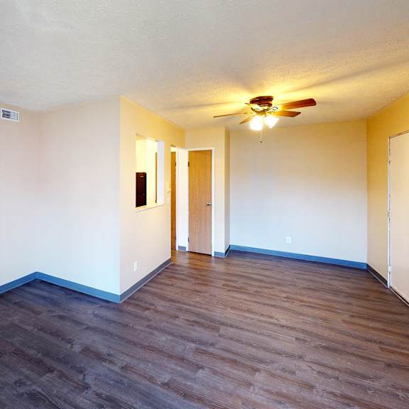 living room with ceiling light at quail meadow apartments, cincinnati, ohio