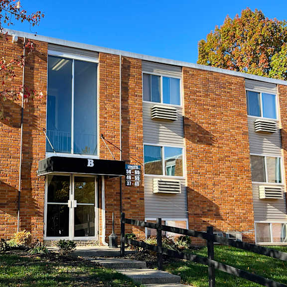 the front of a brick building with a door at barkley ridge apartments, kentucky
