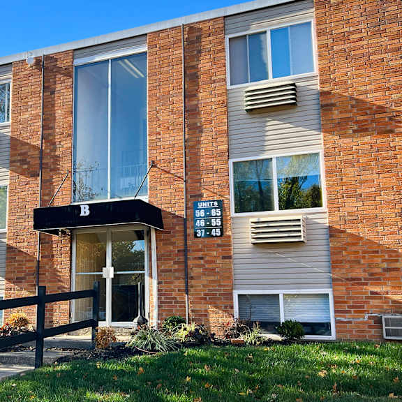 the front of a brick building at barkley ridge apartments, southgate, ky 41071