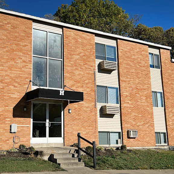 the front of a brick building with stairs at barkley ridge apartments, southgate, kentucky