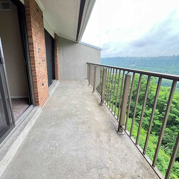 a balcony with a view of a building at indian lookout apartments, cincinnati, ohio, 45238