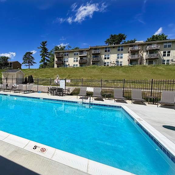 a large swimming pool with a 5 feet depth marking.