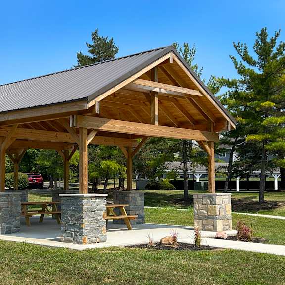 a pavilion with picnic tables in a park at deercross apartments, cincinnati, oh