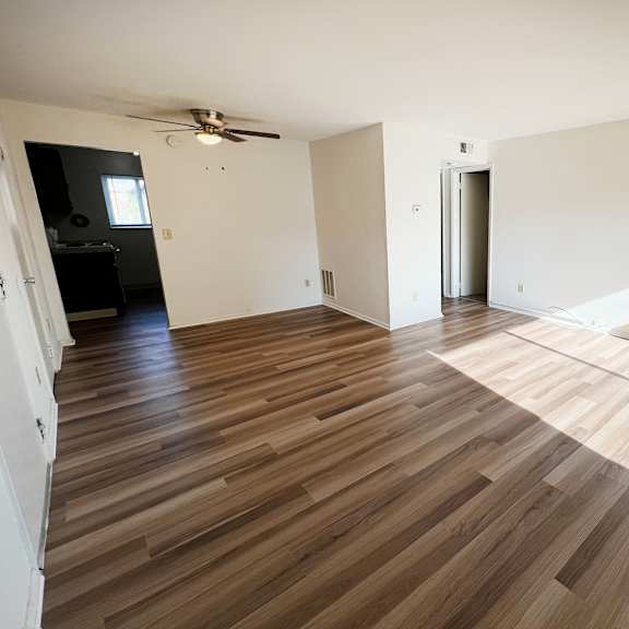 spacious living area at forest park apartments, forest park, oh, 45240