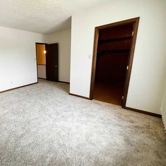 lush wall-to-wall carpeting in bedrooms  at crestbrook apartments & townhomes, kentucky