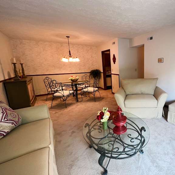 living room with tv  at devou village, ft. wright, kentucky