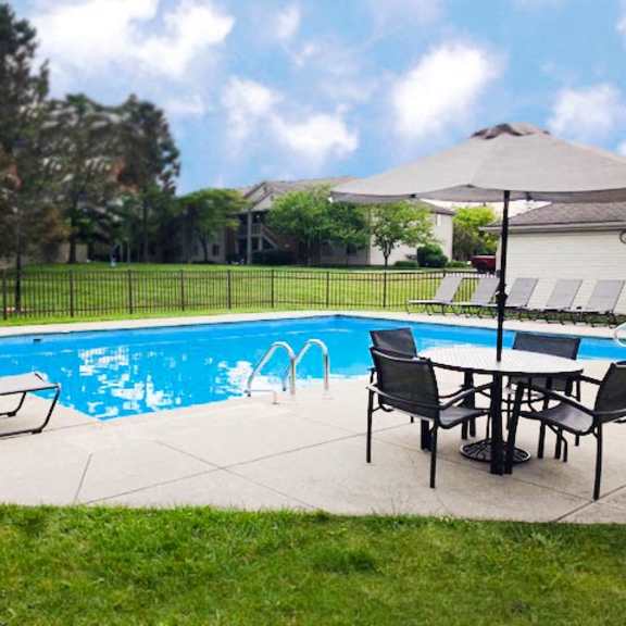 poolside dining table at eagle crest apartments, galloway, ohio