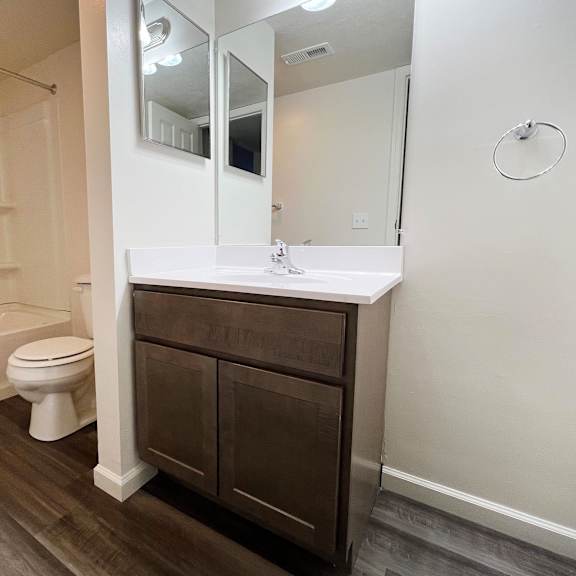 bathroom with sink and cabinet at deercross apartments, cincinnati
