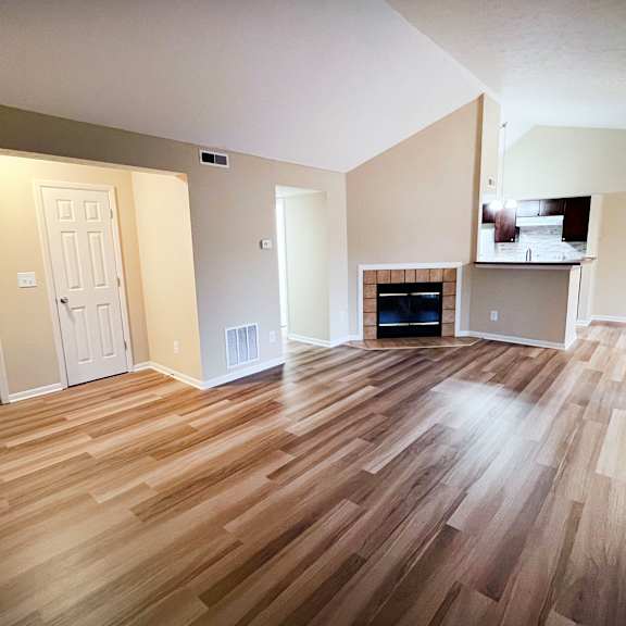 contemporary finishes include wood and tile flooring  at the vinings apartments, cincinnati
