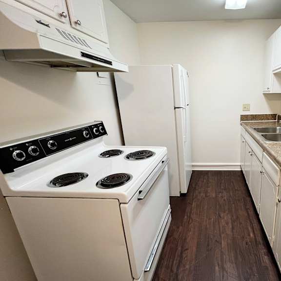 kitchen with custom maple cabinetry  at barkley ridge apartments, southgate, kentucky