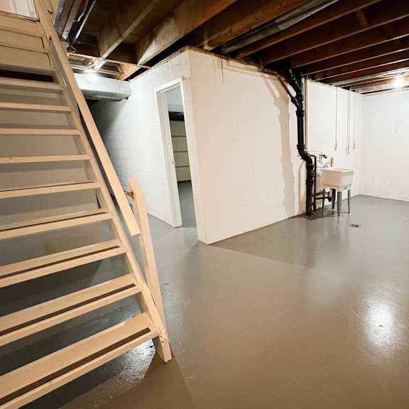 a large room with white walls and a gray floor at wentworth estates apartments, florence, ky