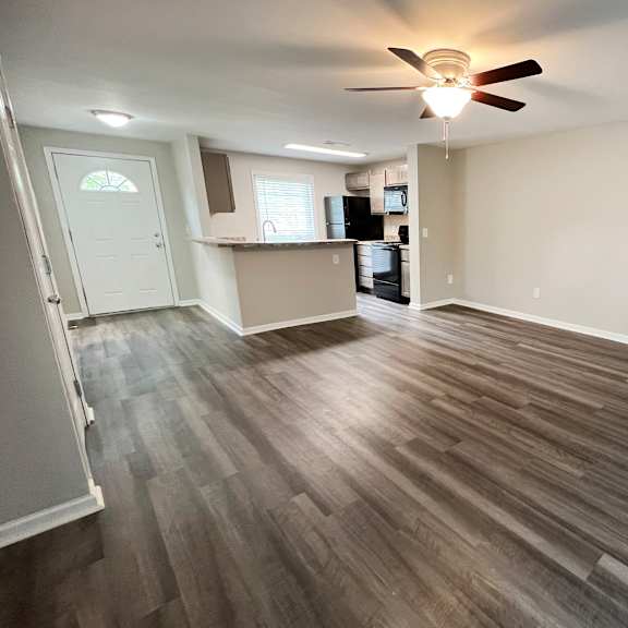 a photo of the living room and kitchen of a 560 square foot, 1 bedroom apartment at  at woodhills apartments, west carrollton, oh, 45449