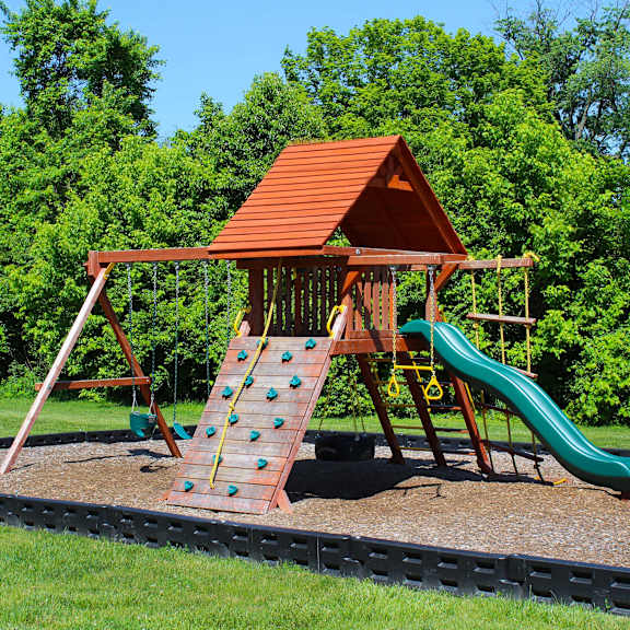 a playset with a swing set and a slide  at four worlds apartments, ohio, 45231