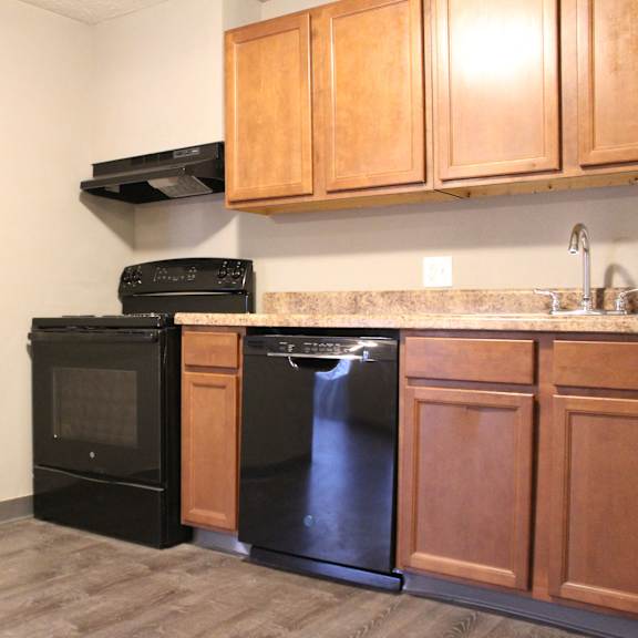 kitchen area with cabinets at quail meadow apartments, cincinnati, ohio