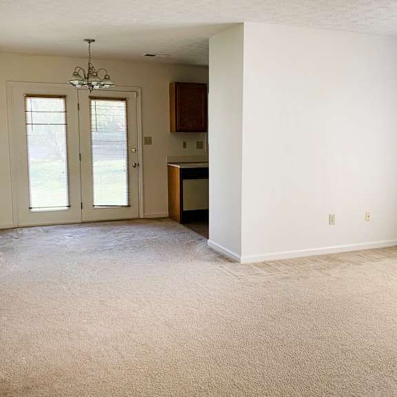 carpeted living area at hartland place, lexington