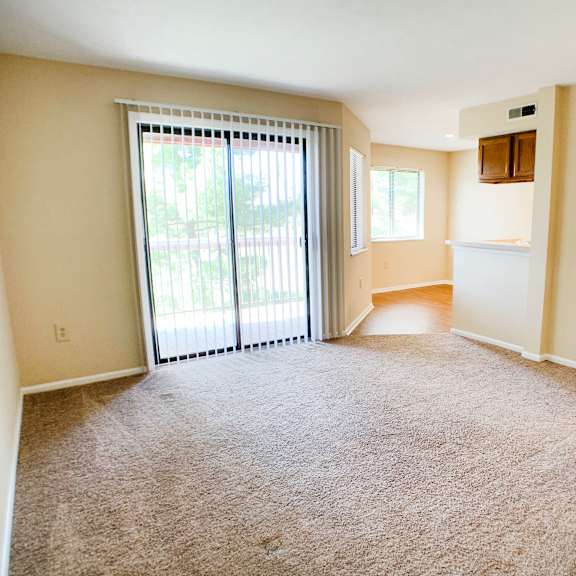 living room with balcony at deercross apartments, ohio, 45236