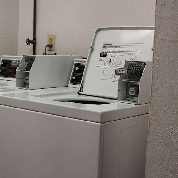 a washer and dryer sitting next to each other at hunter ridge apartments, cincinnati