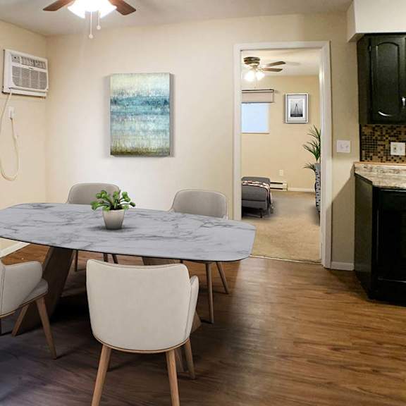 a dining room with a table and chairs at hunter ridge apartments, cincinnati, oh, 45244