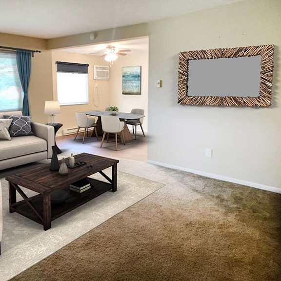 a living room with a couch and a table at hunter ridge apartments, ohio, 45244