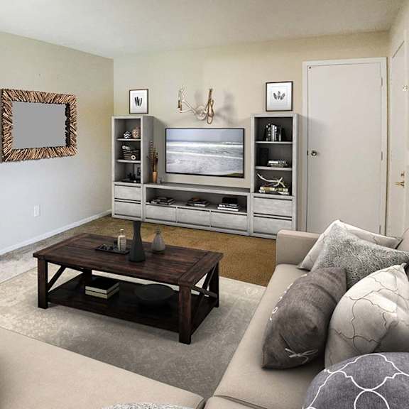 a living room with a couch a table and a television at hunter ridge apartments, cincinnati, ohio