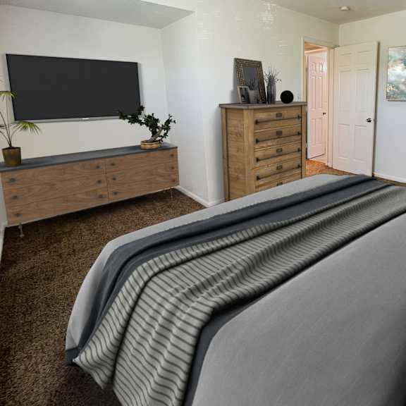 the master bedroom has a large bed and a tvat revere village apartments, ohio, 45458