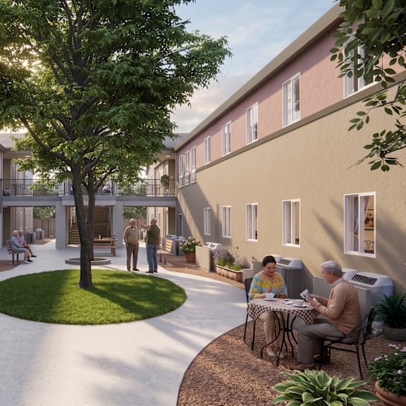 a courtyard with people sitting and walking around.