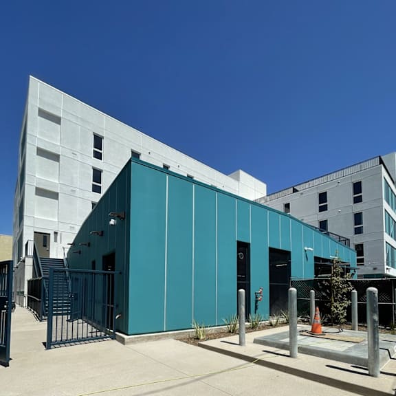 a modern building with a blue and white exterior.