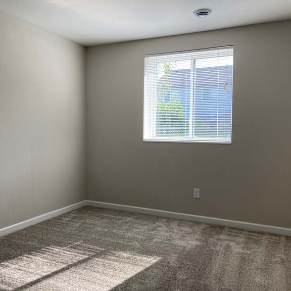 an empty room with a window