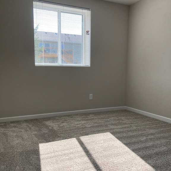 an empty room with a window