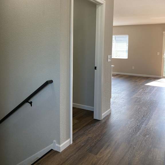 a photo of the hallway and living room of a 560 square foot, 1 bedroom apartment at
