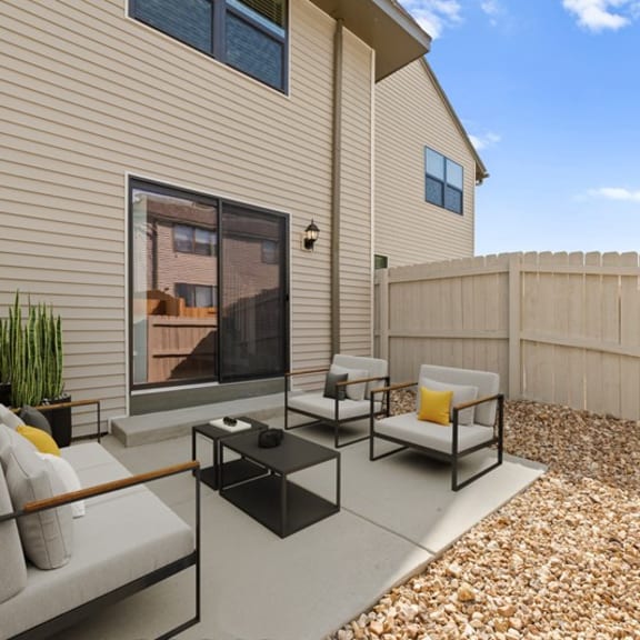 Thumbnail 13 of 13 the backyard has a patio with furniture and a fence
