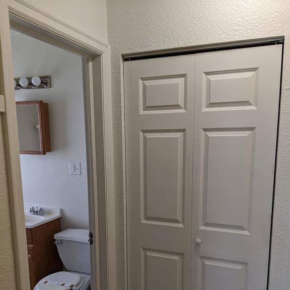 an overhead view of a bathroom with a toilet and sink